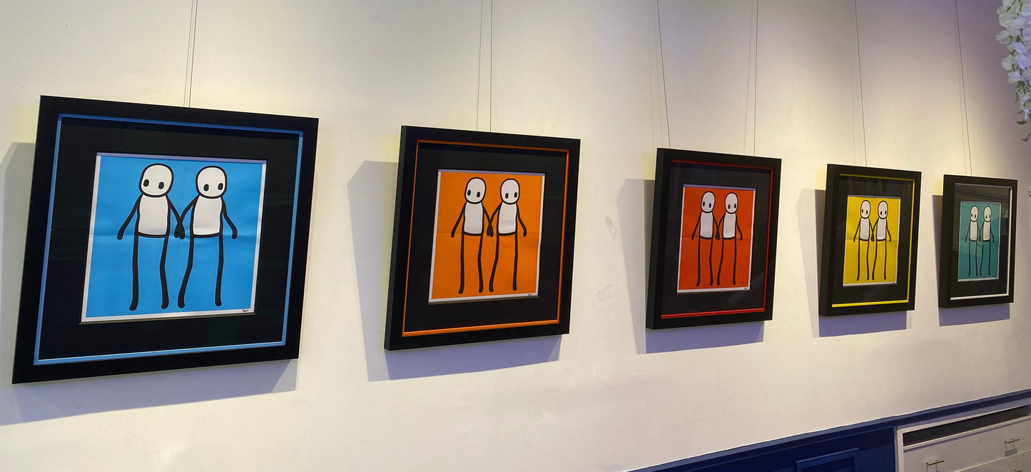 Signed holding hands (Yellow) by Stik